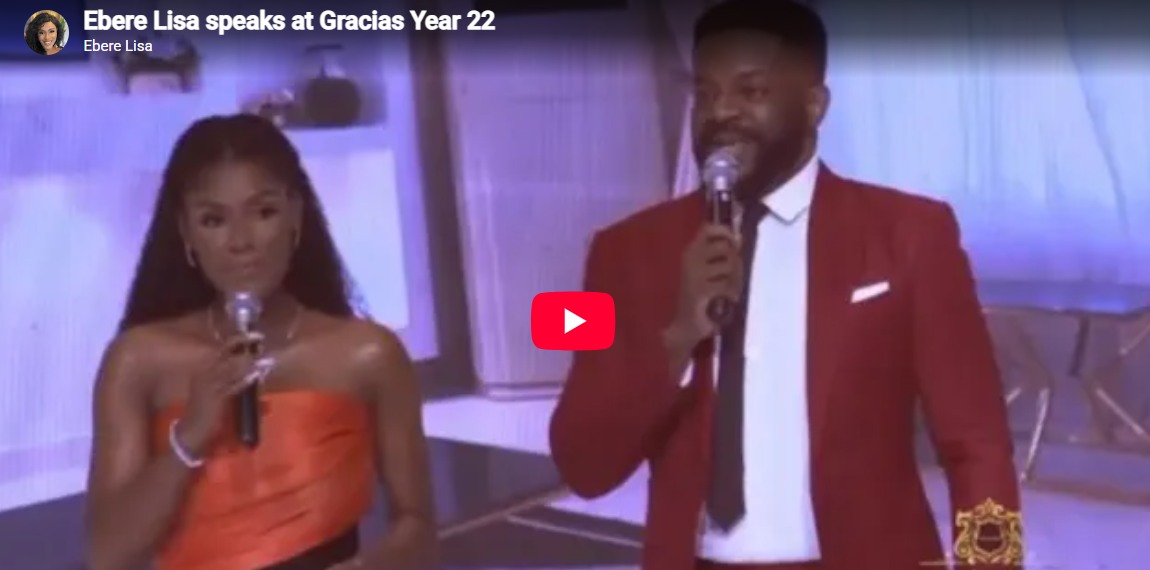 Ebere Lisa presenting on stage at Gracias Year 22